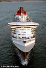 ID 3814 QUEEN MARY 2 (2003/148528grt/IMO 9241061) - looking every inch the ocean greyhound as she approaches Auckland, New Zealand for her maiden call on her inaugural Round the World cruise.